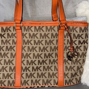 Michael Kors tote purse with orange accents